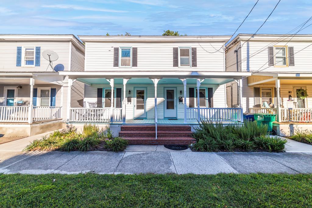 Three short blocks to the beach and right next to Central Park! Two bedroom, one bath home on each side. Ideal for vacation rentals. Handsome wood floors, replacement windows, new roof and updated kitchens and baths!!