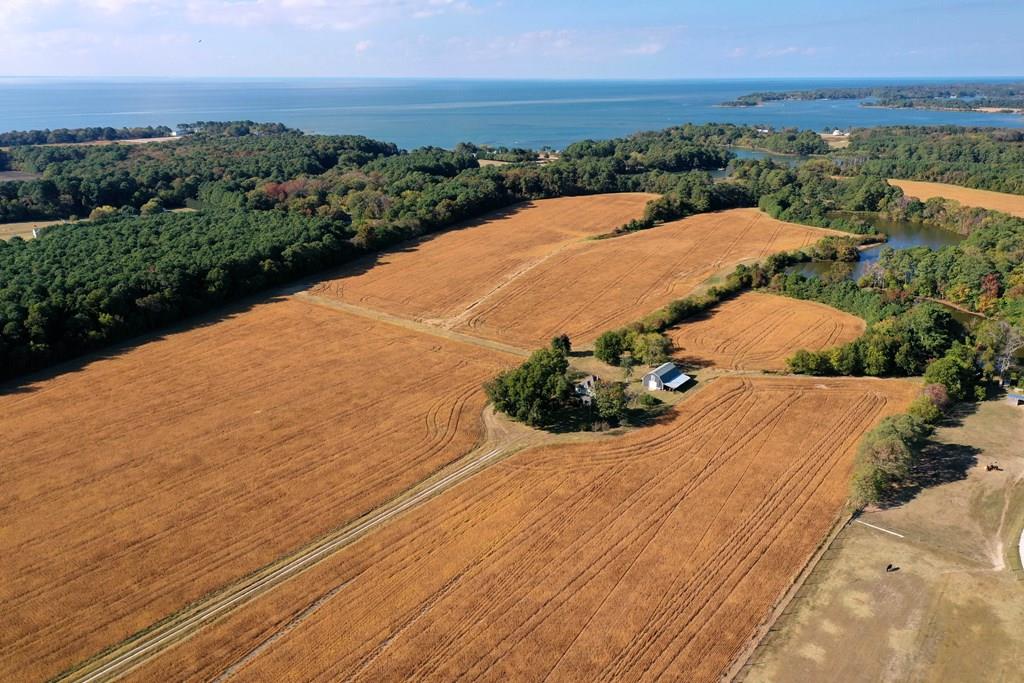 A RARE OPPORTUNITY TO ACQUIRE A WATERFRONT FARM CLOSE TO THE HISTORIC TOWN OF CAPE CHARLES!  This beautiful 69+ acre farm offers the quintessential Eastern Shore country lifestyle so whether youre looking for acreage for privacy, horticulture or horses this wonderful farm offers a multitude of possibilities. The approx. 2,000 ft of waterfrontage on a 10 acre pristine pond is the perfect place to enjoy an abundance of birds & wildlife. The lovely point on Barlow Creek is a great place to launch your kayak for trips out to the Chesapeake Bay.  The 1,920 sq ft 4 bdrm 2 bath home needs updating but the spacious living areas it offers can be renovated to be a gorgeous home. If youre looking for a property with a lot of tranquility but close to the Shores best amenities, THIS IS A MUST SEE!