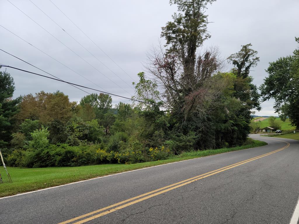 Nice building lot in a quiet, country setting. Close to schools and towns. Interstate close by. Slightly sloping with view. Public water available for this property but will require septic system.