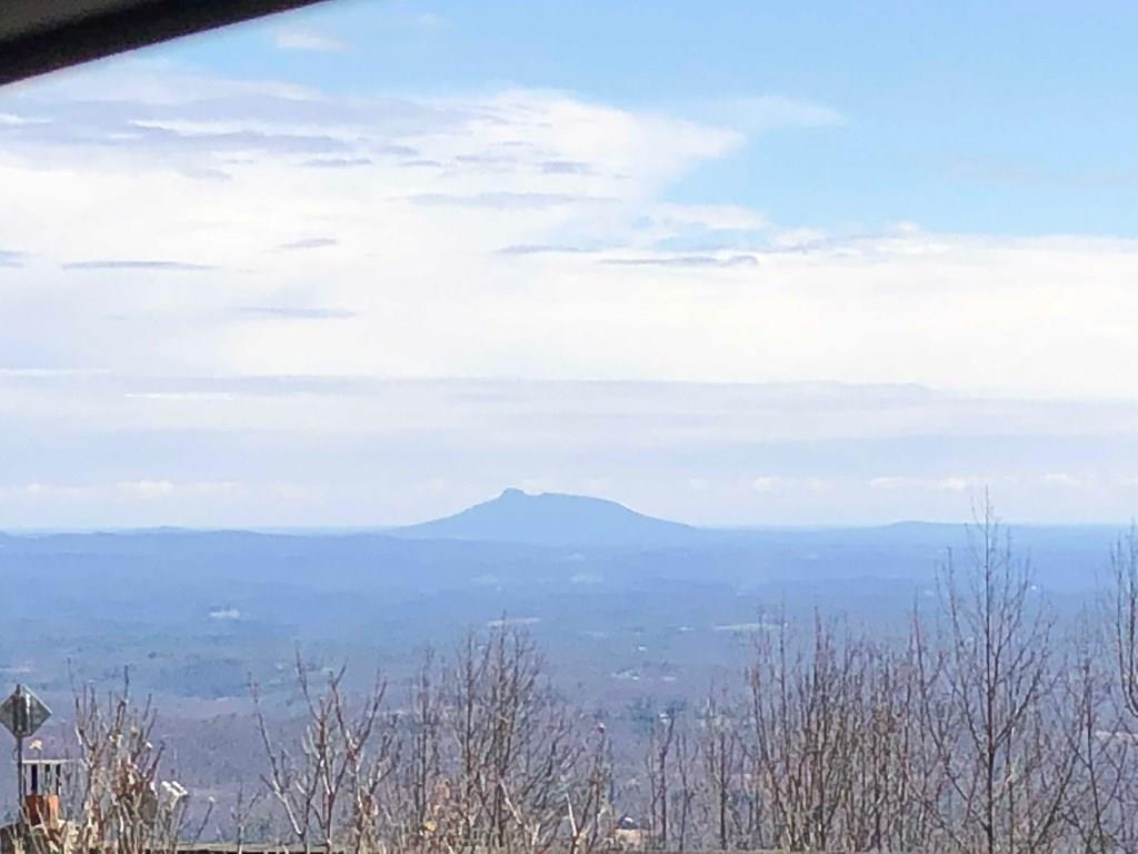 Beautiful views from this building lot in Cascade Mountain resort. Gated community with swimming pool, tennis courts, fish pond, common area and Community water available.  Build your dream home in this private upscale community.