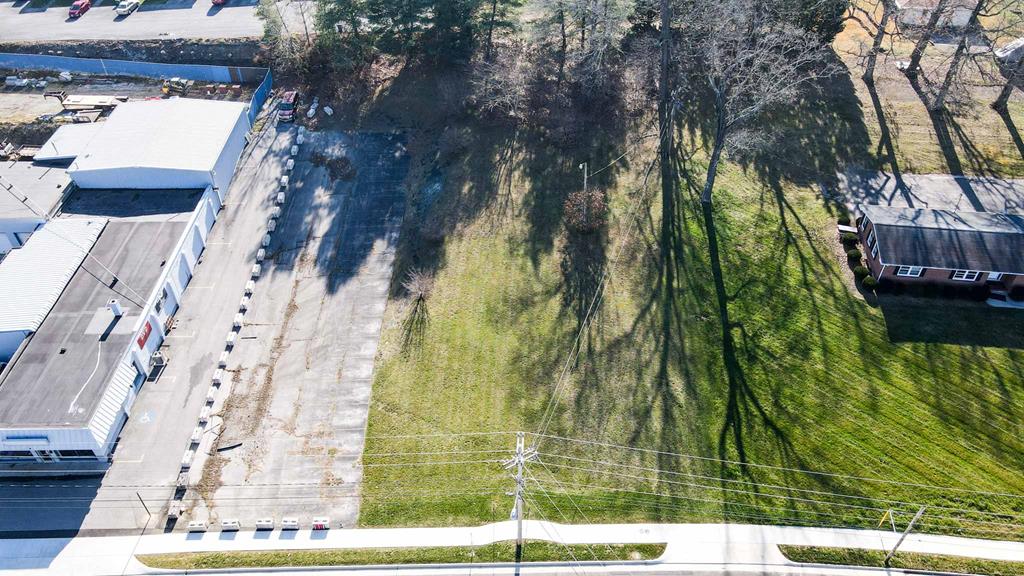 Commercial lot with 164 ft. of frontage on Roanoke St. Plan your new business from the ground up on this level lot. VDOT approved entrance recently installed. Town of Christiansburg has completed sidewalk installation. Parking area is included. Concrete barriers along left side will be removed by seller. Temp electric pole has been disconnected, will be removed by seller.
