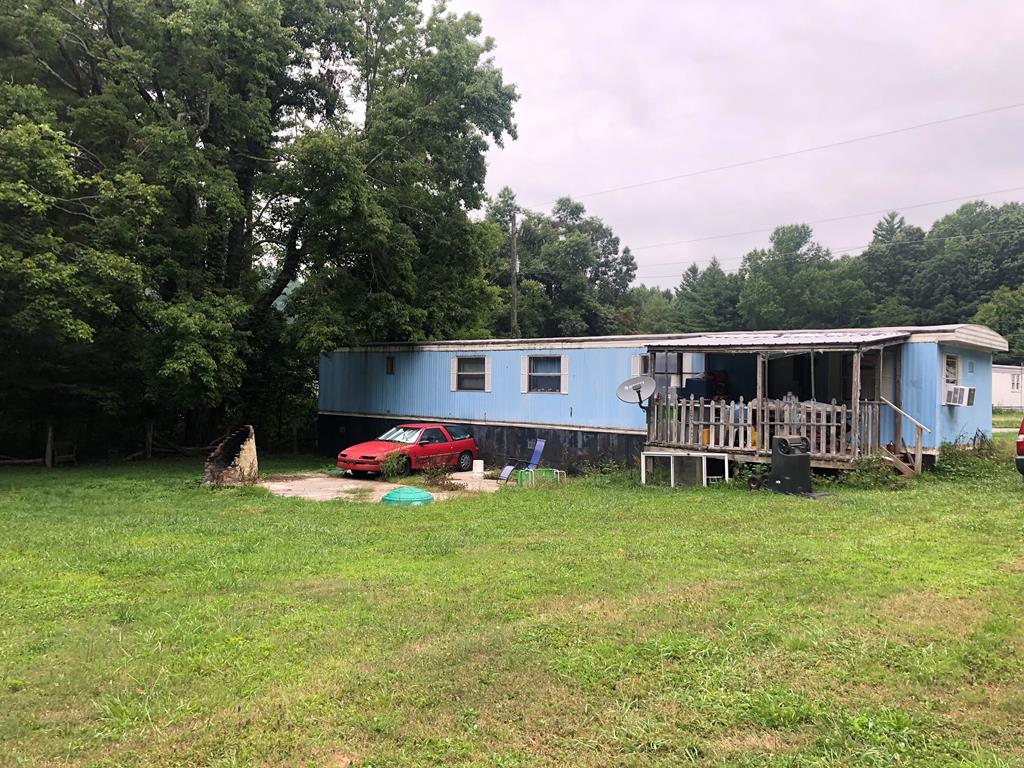 Manufactured home in Floyd County. Currently produces rental income or great for full time residence, 2 bed 1 bath  well septic and nice level lot with outbuilding.