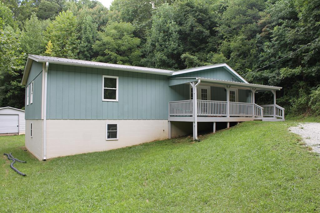 3 parcels include 142-A-96.  Property is in a private setting on 4.7 acres with creek, metal storage building, new well. Completely remodeled - new hardwood floors, newly painted, granite counter tops, custom cabinets.  Internet availability unknown.  Seller is broker/owner.  Additional DB 1042, PG 306.