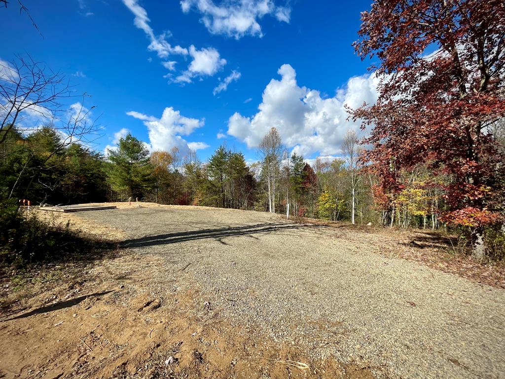 Check out this 2 acre tract!  Located just outside of town the property is partially cleared for a home site with Septic, Electric and Well already in place and ready for your home in a nice country setting!