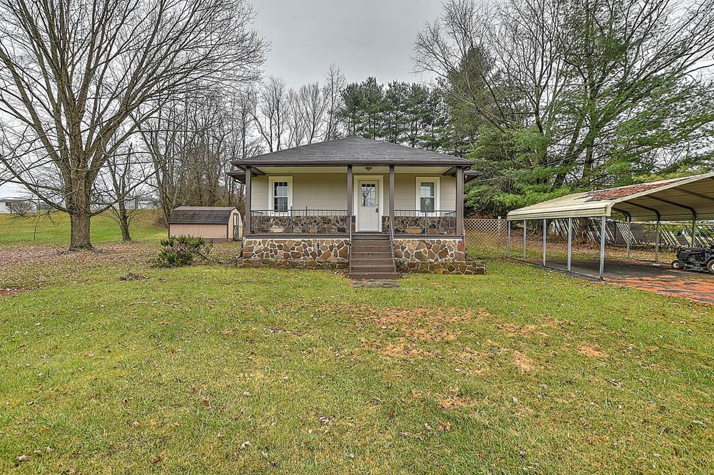 A nice bungalow located just minutes from interstate- 81, as well as just minutes away from Emory & Henry College.  Also located 10-15 minutes from downtown Abingdon, Va. This 1268 sqft. home has mature pine trees to the side of the house and also around the back that provides nice privacy. The kitchen has new flooring and countertops. The bathroom has been completely redone. There is new paint throughout the house, new windows, new front and back doors, newer heat pump (about 1 year old). Exterior has been recently painted. Septic system has been pumped within the past six months.  All kitchen appliances convey with property.  House is being sold as is.  *Buyer/buyer agent to verify all information!*