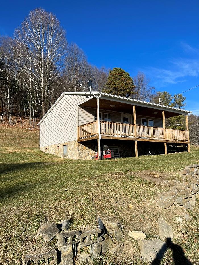 Come enjoy the Blue Ridge Mountains in this 2 bedroom 1 bath home! Home features hardwood floors and tile throughout and with a little TLC this would be a great place for a weekend get-away or an AirBNB. Relax in the peacefulness of the mountains and watch the wildlife from the front porch.  Close to shopping and stocked trout stream.