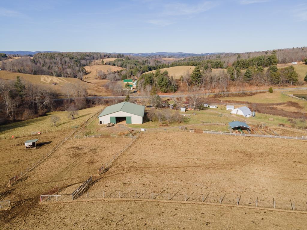 Beautiful working farm with over 80 acres, long range views, and bold creek frontage. The farm consists of two barns, one 80x80insulated barn w/ 10' double doors, another that is a two level barn that's 30x30 and built in 1948 There are other outbuildings to give you plenty ofspace for storage. Cross fencing already in place with running lanes to easily move cattle/livestock to and from different paddocks. Covered workingcorral w/ squeeze chute and other farm amenities make this farm turnkey and ready for you to farm today. Mature apple, pecan, peach, and pear tresssurround the big barn. One of the most picturesque farms on the market in SWVA, call today for more details.