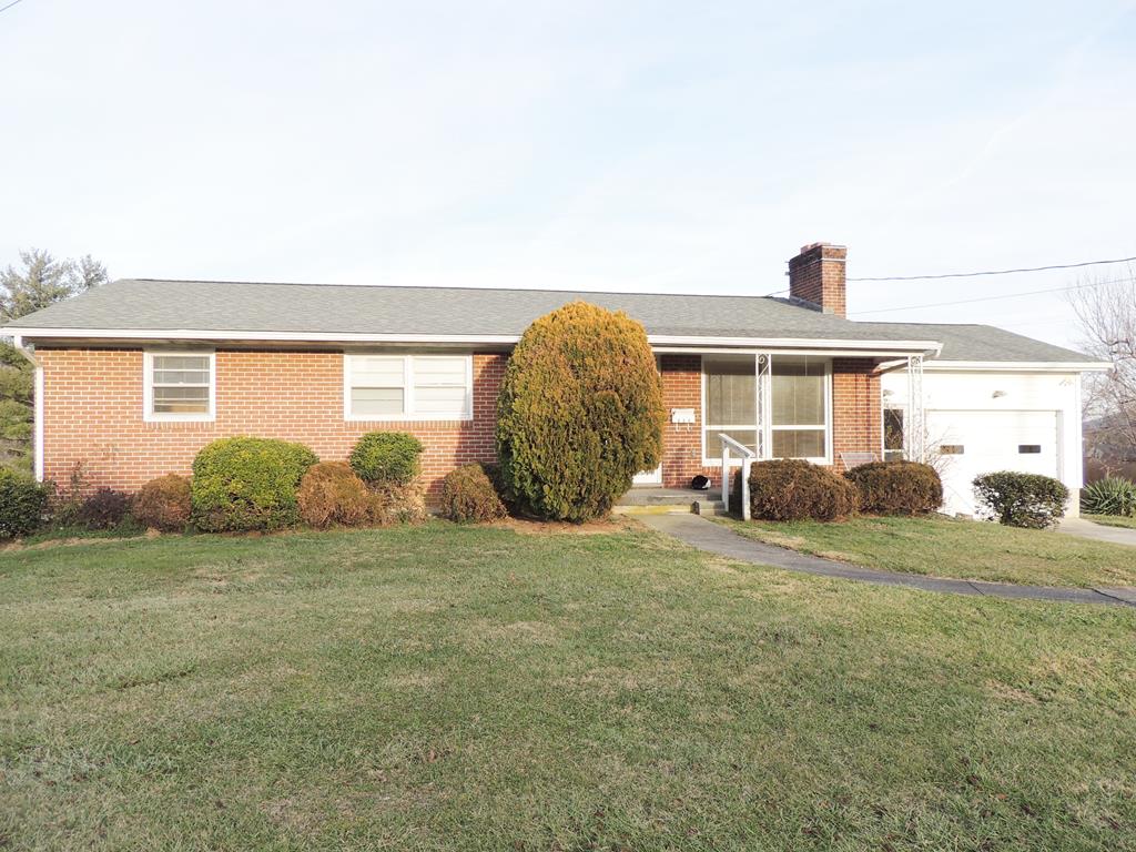 5 Bedroom 2  Bath Brick Ranch Home located in the Town of Wytheville. This property features: 2288 Sq. ft. of living space, 840sq.ft. 2 tier Back deck  (great for parties and outdoor living), 840 sq. ft. patio, outbuilding, 2 fireplaces (one is floor to ceiling brick), 320 sq. ft. attached garage, huge Den/Family Room, 2nd Kitchen in basement (great for a Mother In Law Suite), Central Vac, Public Water & Sewage, 72 sq. ft.  front covered porchWow, just seconds away from Hospital and in town shopping, restaurants, etc