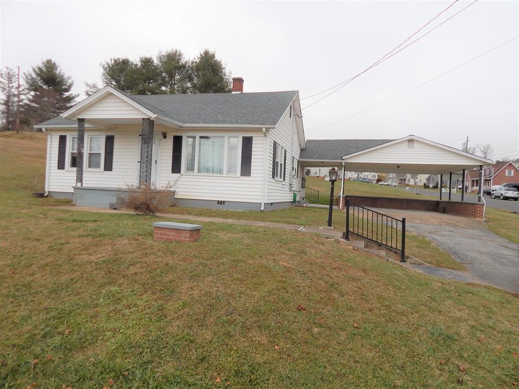 This is a great starter home or rental property! 2 bedrooms, Bath, Living Room, Dining Room, Kitchen, Utility Roo, Harwood floors, double car carport, large lot, out building and more!