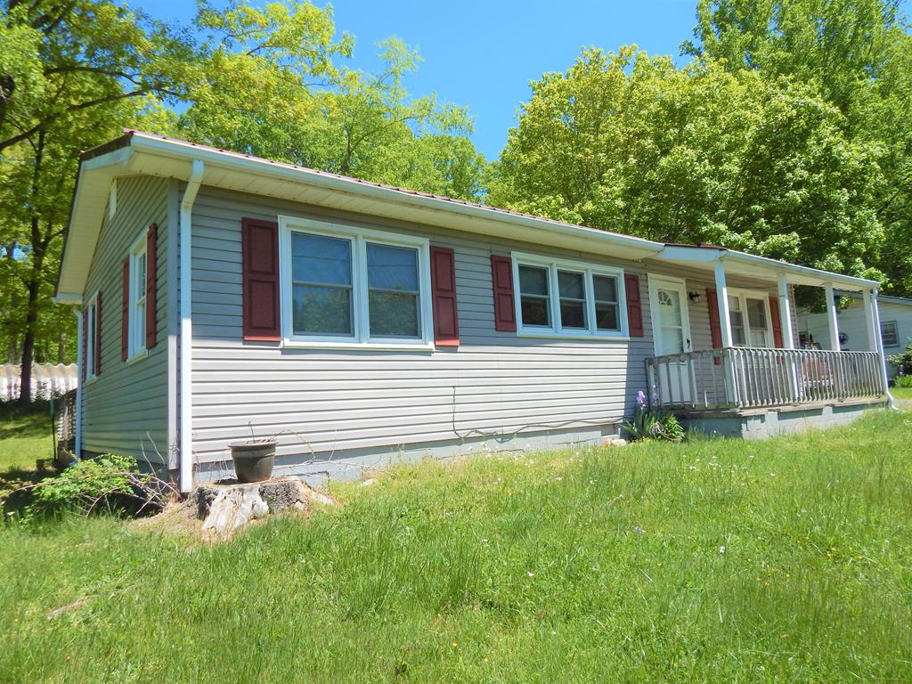 Starting Up or Slowing Down this is the perfect Home for you. 3 bedrooms, baths, Utility room, covered front porch, rear wood deck patio, covered side porch, kitchen. This would be great for a Rental House or just to down size.