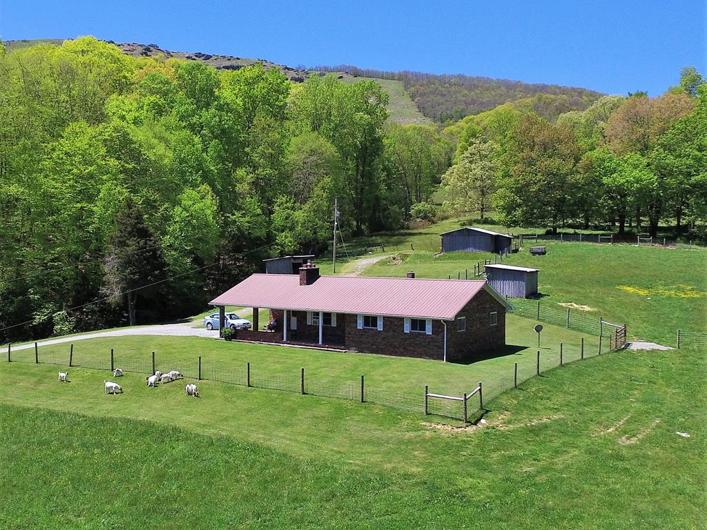 Traditional brick ranch located just outside the town of Independence. Country setting overlooking the long-range view of local farms. If you are looking to downsize or a starter home this is perfect with 2.5 acres to enjoy. Call to set up your showing today!