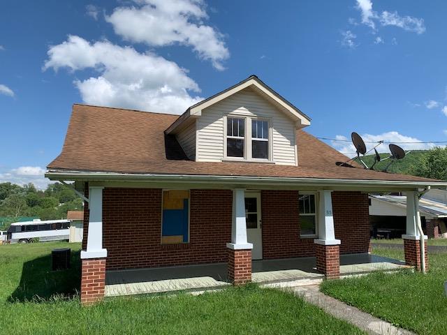 3 BEDROOM, 1 BATH, BRICK HOME FEATURING HARDWOOD FLOORS, UNFINISHED BASEMENT, OUTBUILDING, 1 CAR DETACHED GARAGE, LEVEL CORNER LOT. LOCATED IN THE COUNTY, ACCORDING TO TAX CARD YET JUST MINUTES TO IN TOWN AMENTITIES.  NO DOCUMENTS ON FILE.